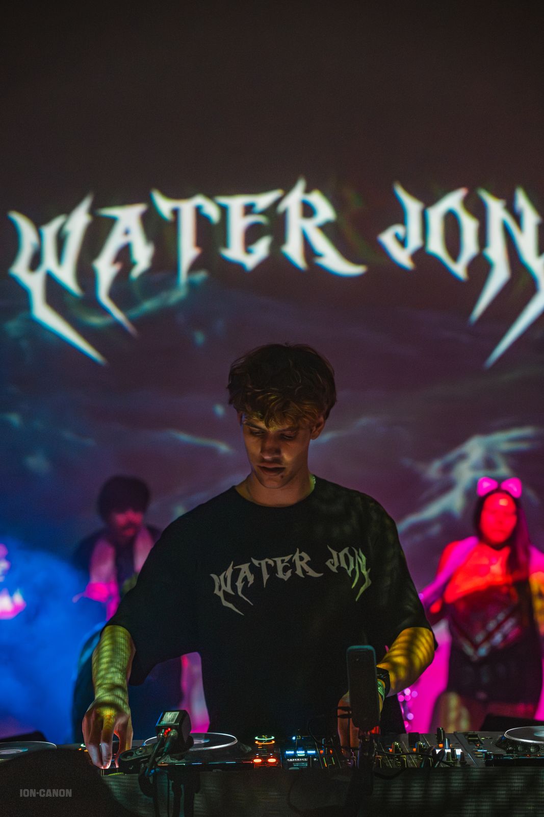 At the decks under the WATER JON logo, Electric Playhouse